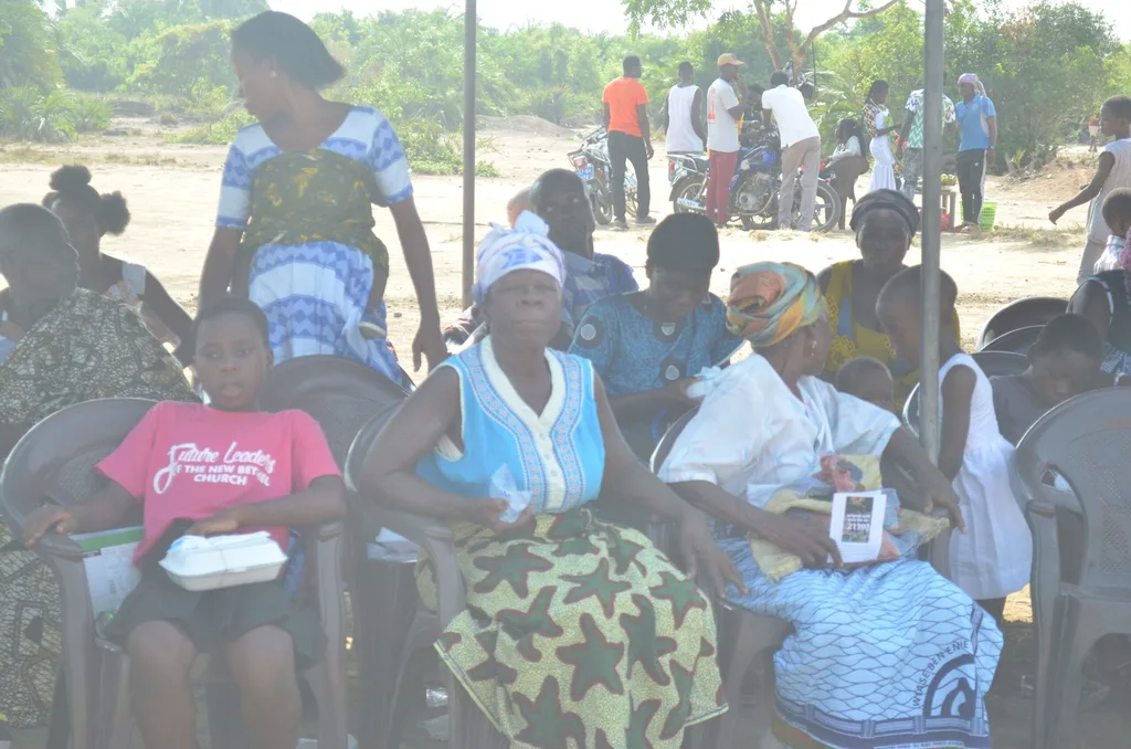 Members of the community sitting in anticipation