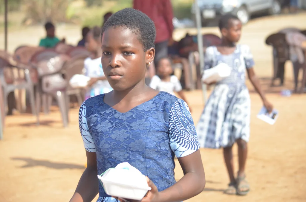 A child with her portion of food