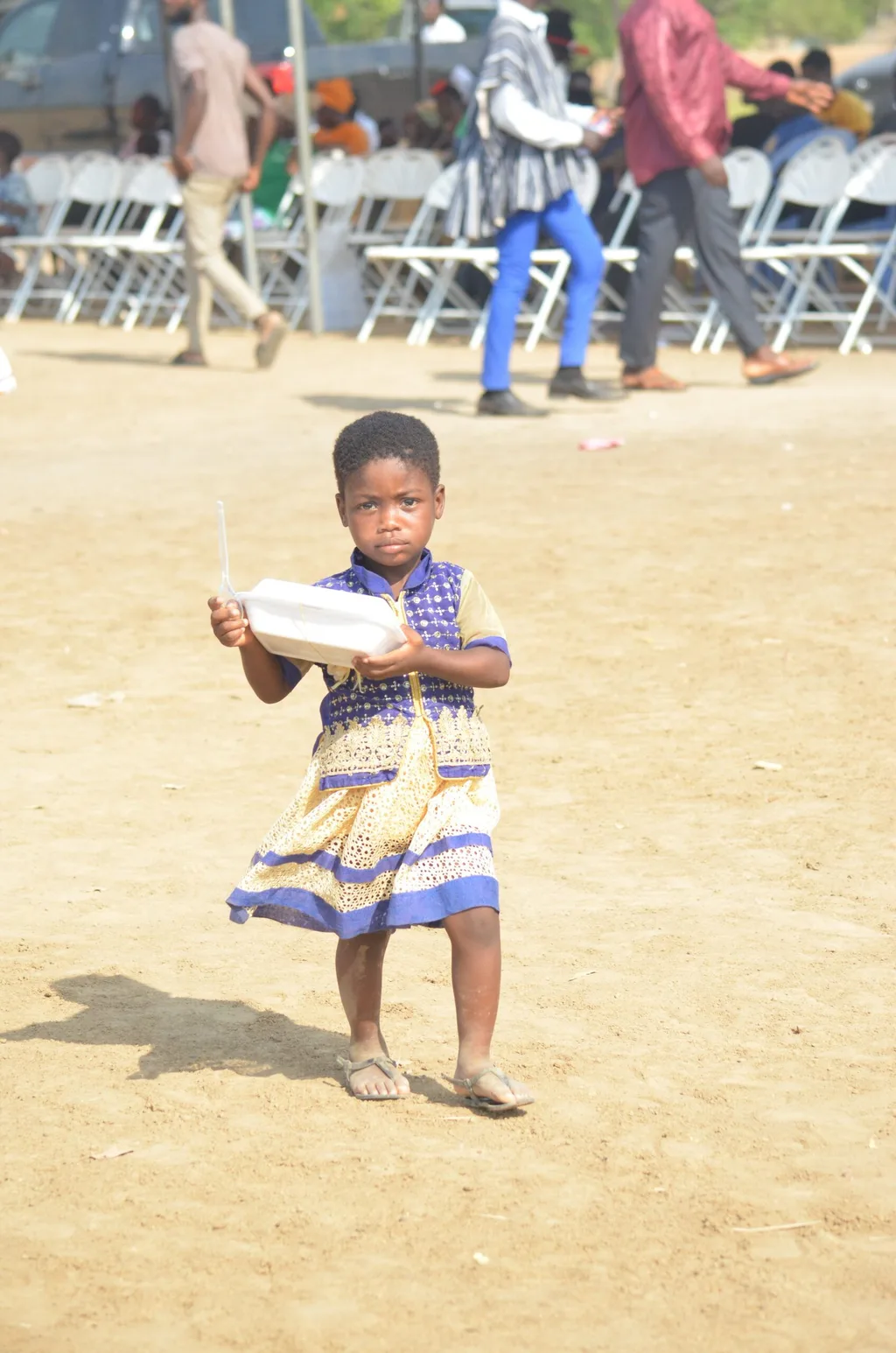 A child with her portion of food
