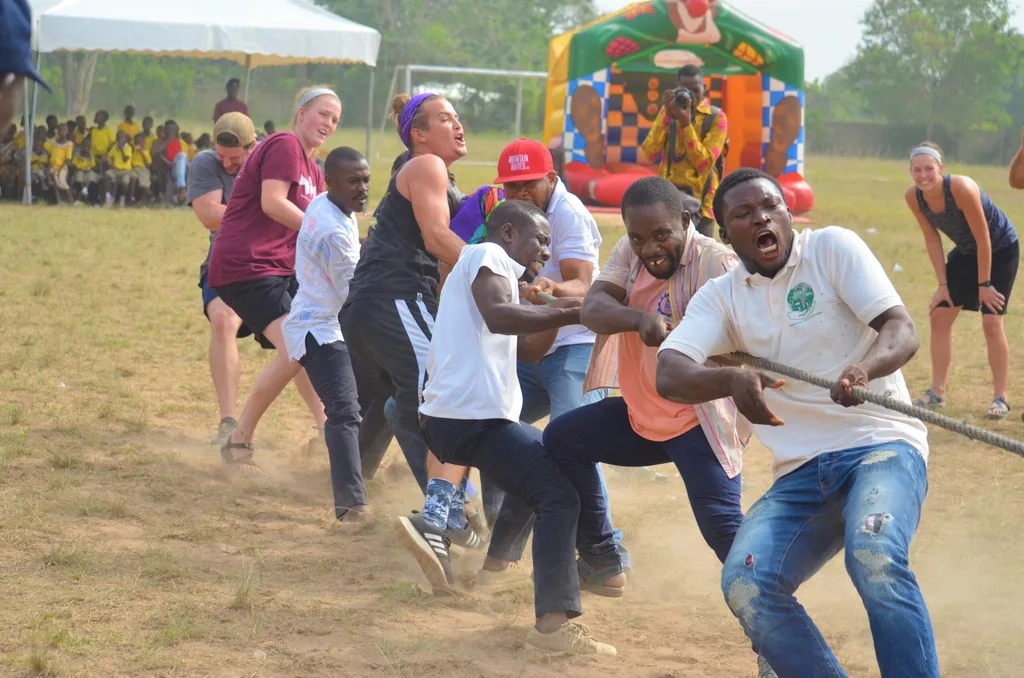 A tug of peace game with the members of the community